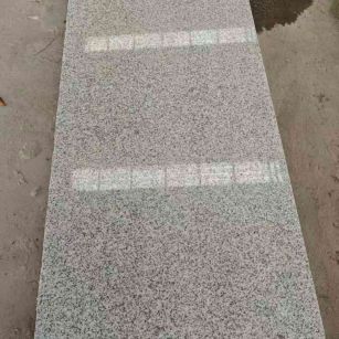 舟山芝麻白光面毛板